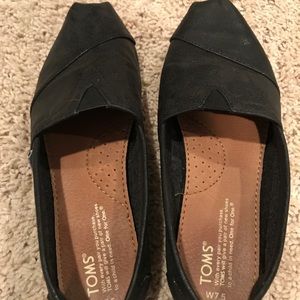 Women’s TOMS size 7.5 wide black leather flats